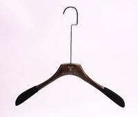 Clothes shop hanger with velvet shoulders and customized logo