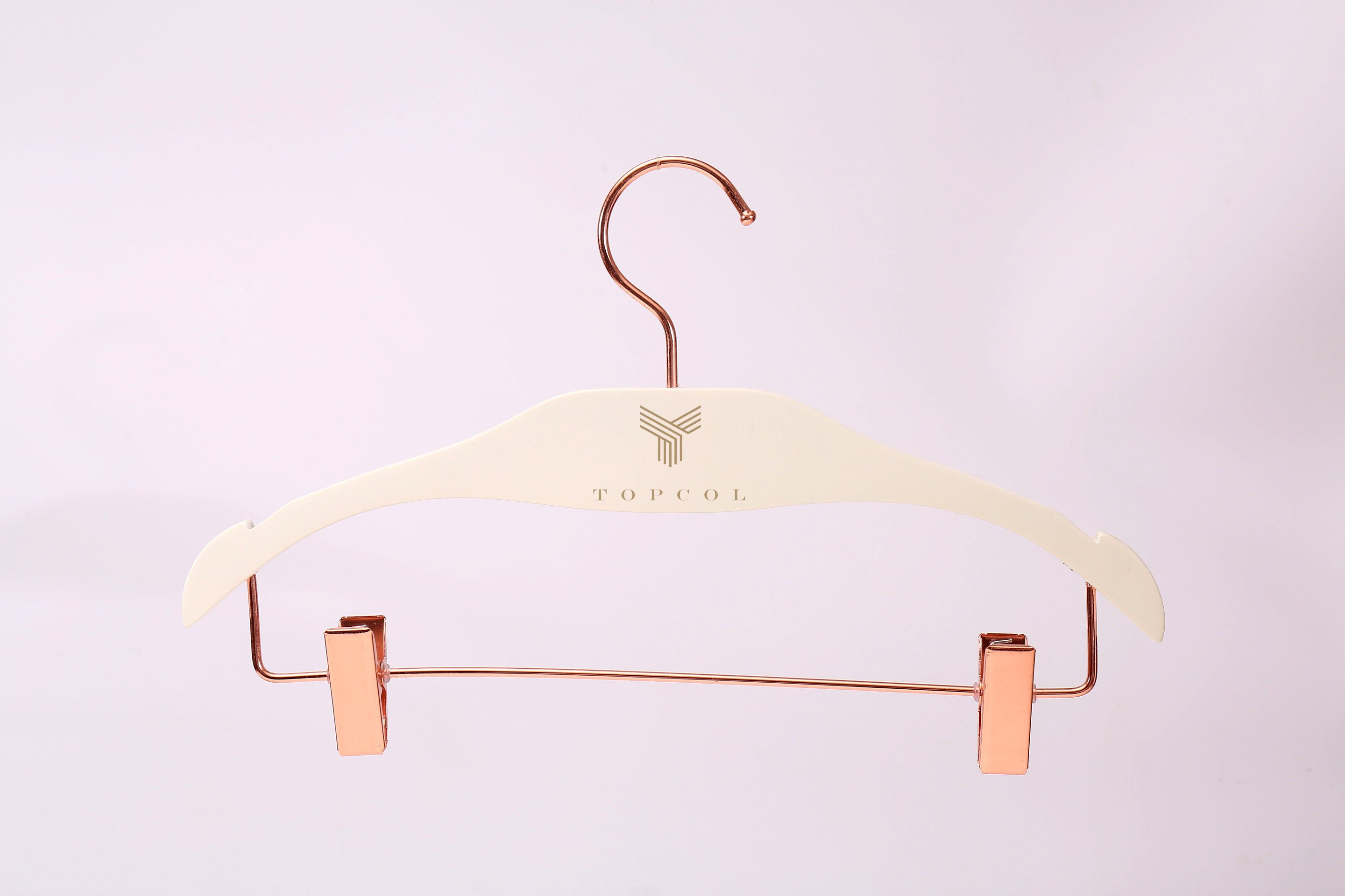 White wooden pants hanger with Copper hook and copper clips